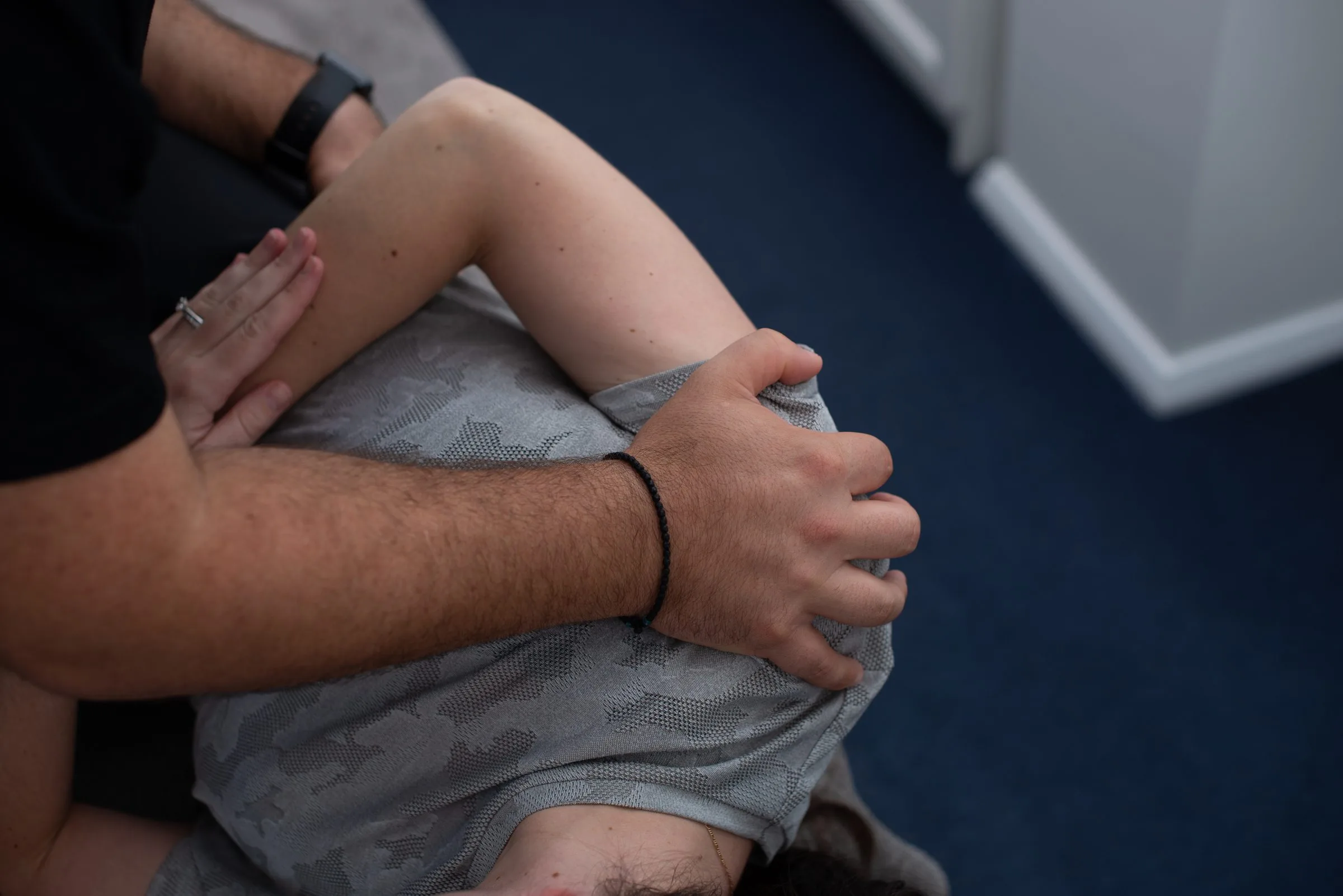 Chiropractor mobilising a patient's joint