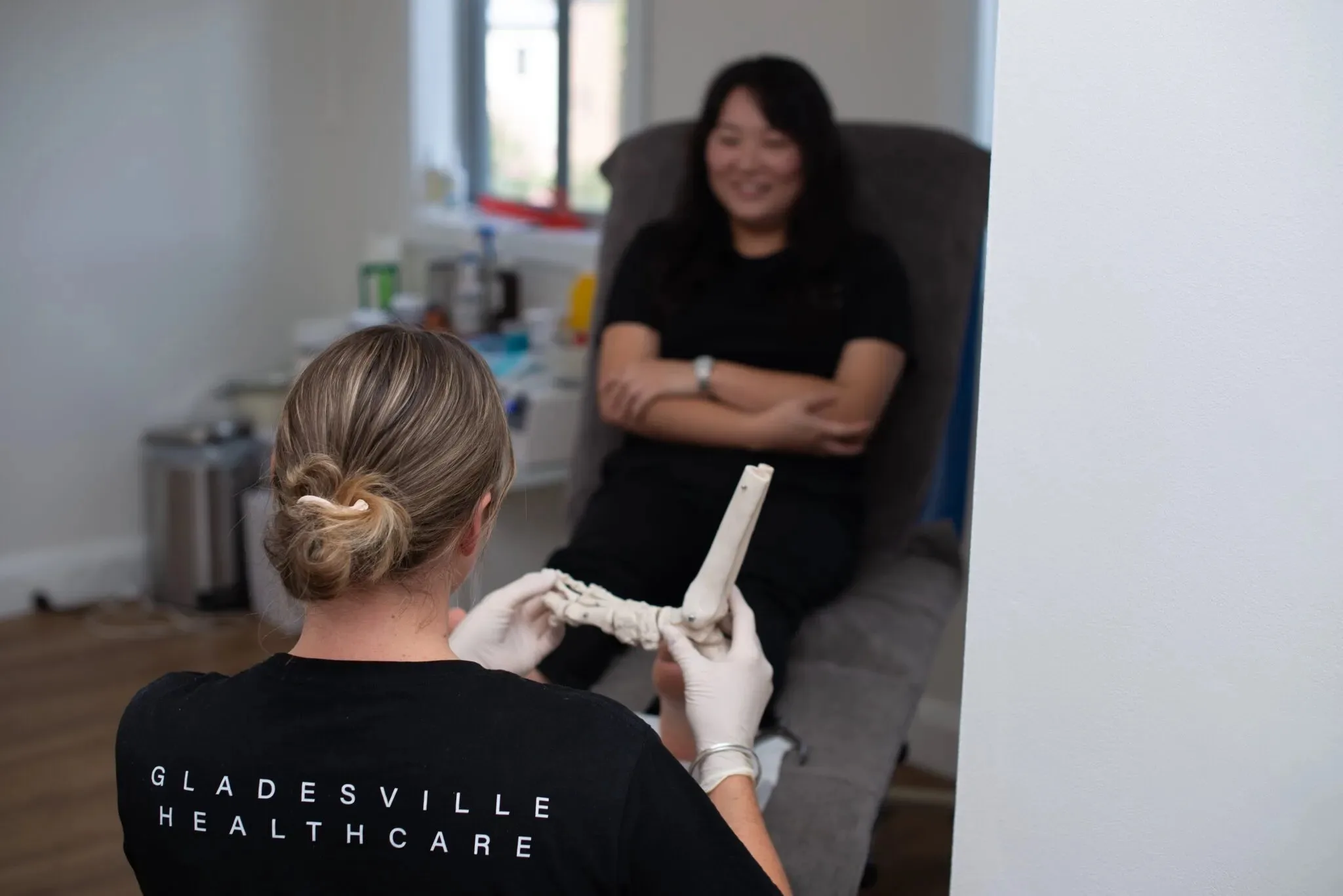 Gladesville Healthcare podiatrist with a patient